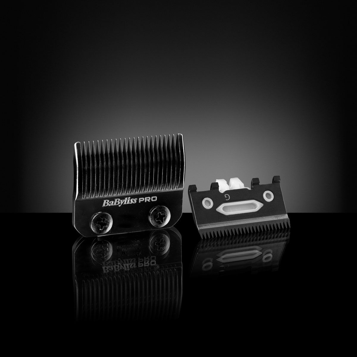 Super Motor Cordless Clipper Graphite Taper Blade (Black) front and back on dark background